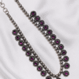 Arvana traditional necklace with ruby-toned accents